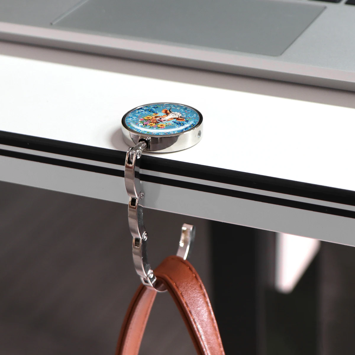 Ganchos para bolsos con pintura al óleo, soportes plegables de Metal para bolsas de mesa, perchas portátiles para monedero, accesorios de piezas, ganchos antideslizantes de vaca bonita - imagen 4