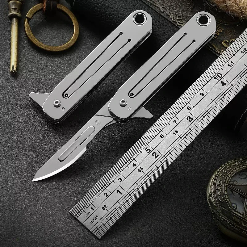 Cuchillo táctico plegable acero inoxidable con llavero para exteriores - imagen 2