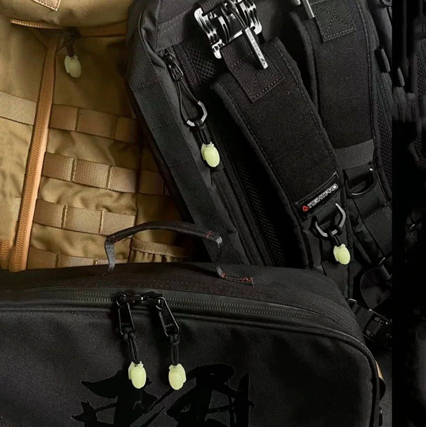 Mochila táctica con forma de granada, bolsa de Montañismo con cabeza de tracción luminosa con cuerda con cremallera, colgante de Paracord alternativo para exteriores - imagen 4