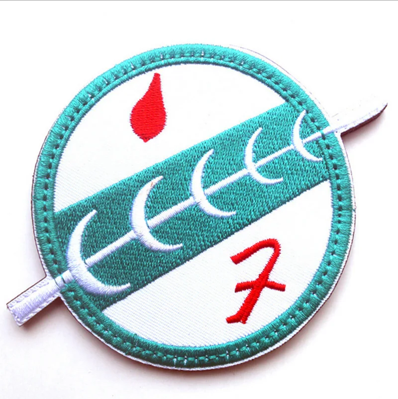 Verso del parche mostrando el sistema de cierre