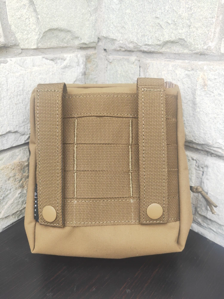 Bolsa compacta para cintura o montaje en sistema de carga