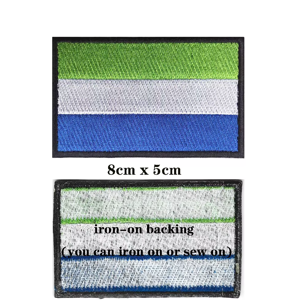 Parche bordado con bandera de Sierra Leone en fondo oscuro