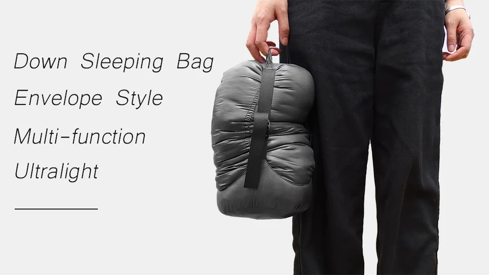 Saco de dormir ultraligero extendido en campsite