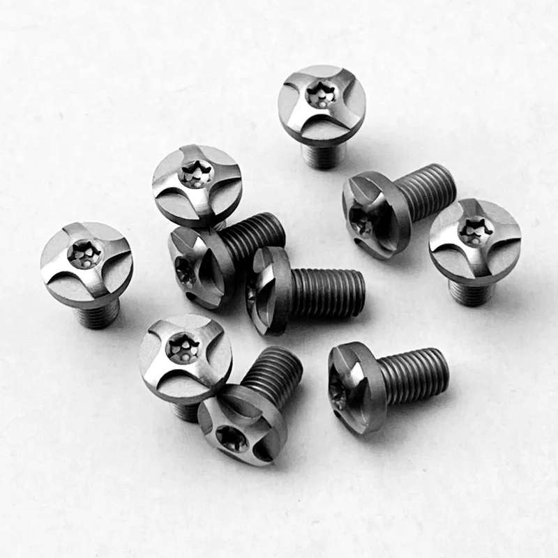 Conjunto de tornillos y pieza de agarre