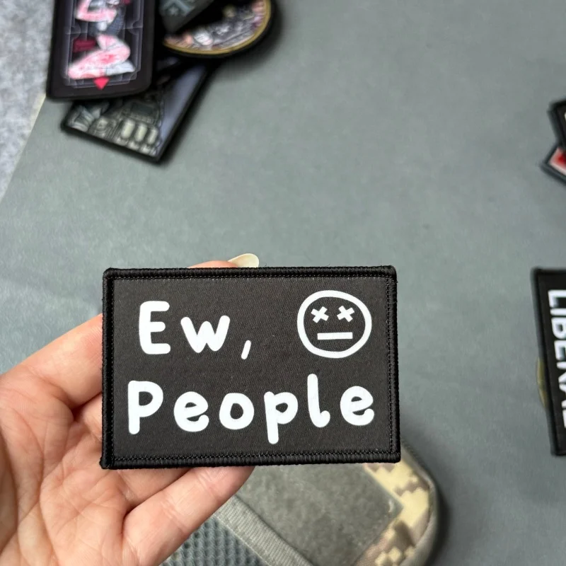Parche de moral táctico con diseño de personas y velcro