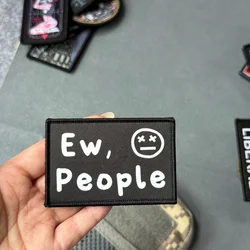 Parche de moral táctico con diseño de personas y velcro