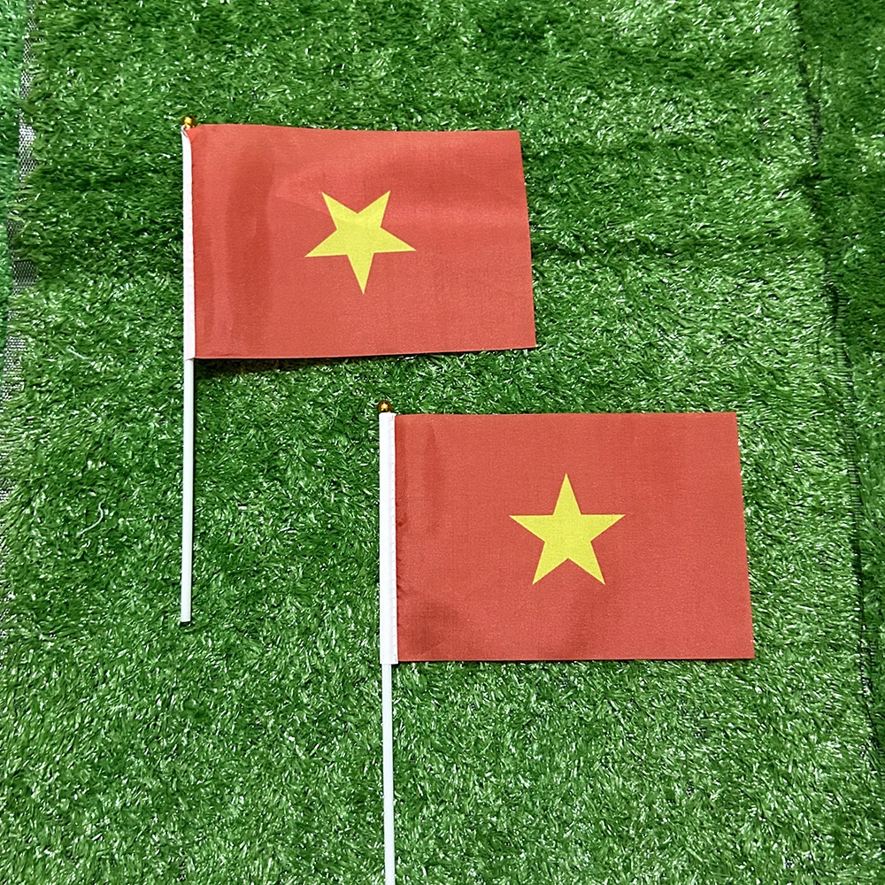 Bandera Vietnam con poste de plástico en mano