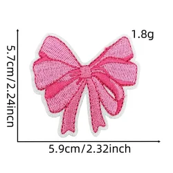 Parche de planchado dibujo animado rosa con lazo Navidad