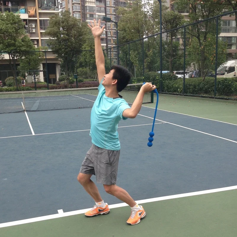 Entrenador de tenis profesional para práctica con paleta y látigo - imagen 3