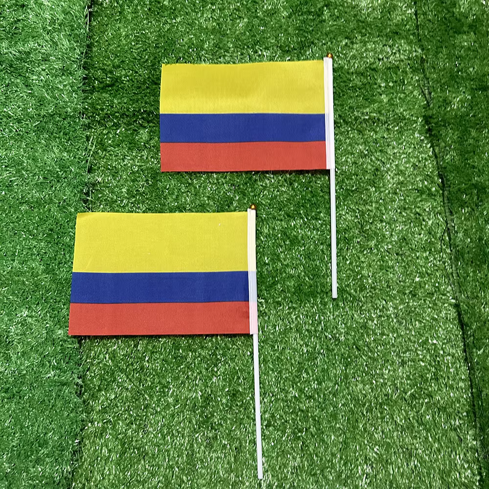Banderas manuales Colombia 21x14cm con mástil plástico – Deportivo - imagen 3