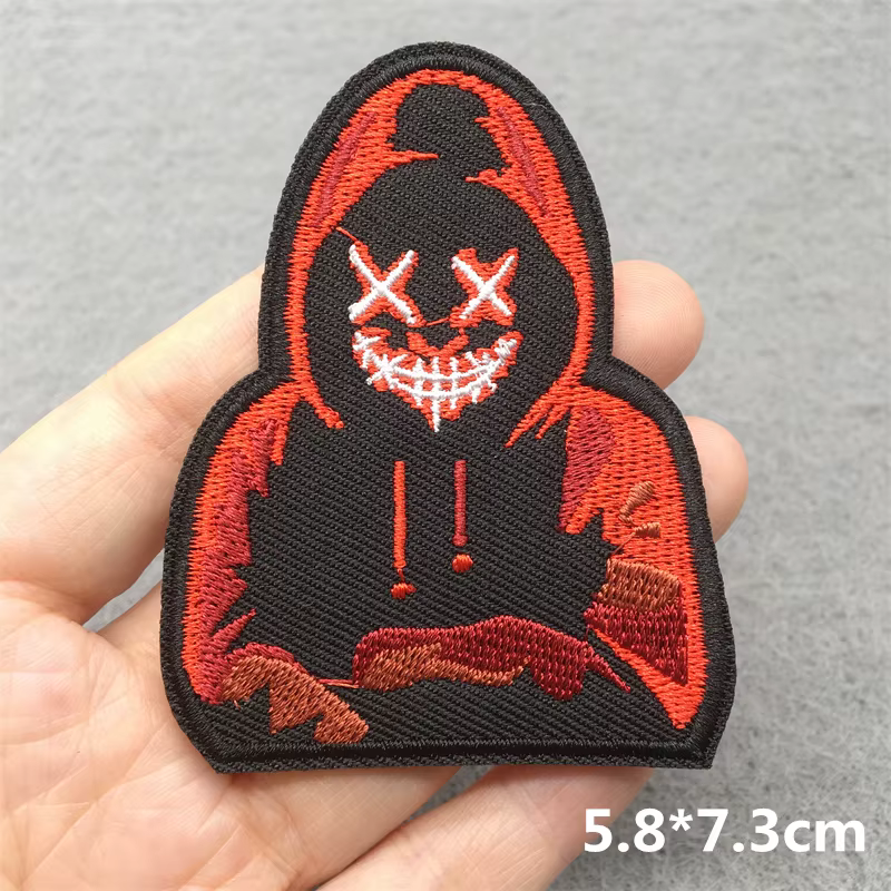 Conjunto de parches bordados con eslogan y motivos cartoon