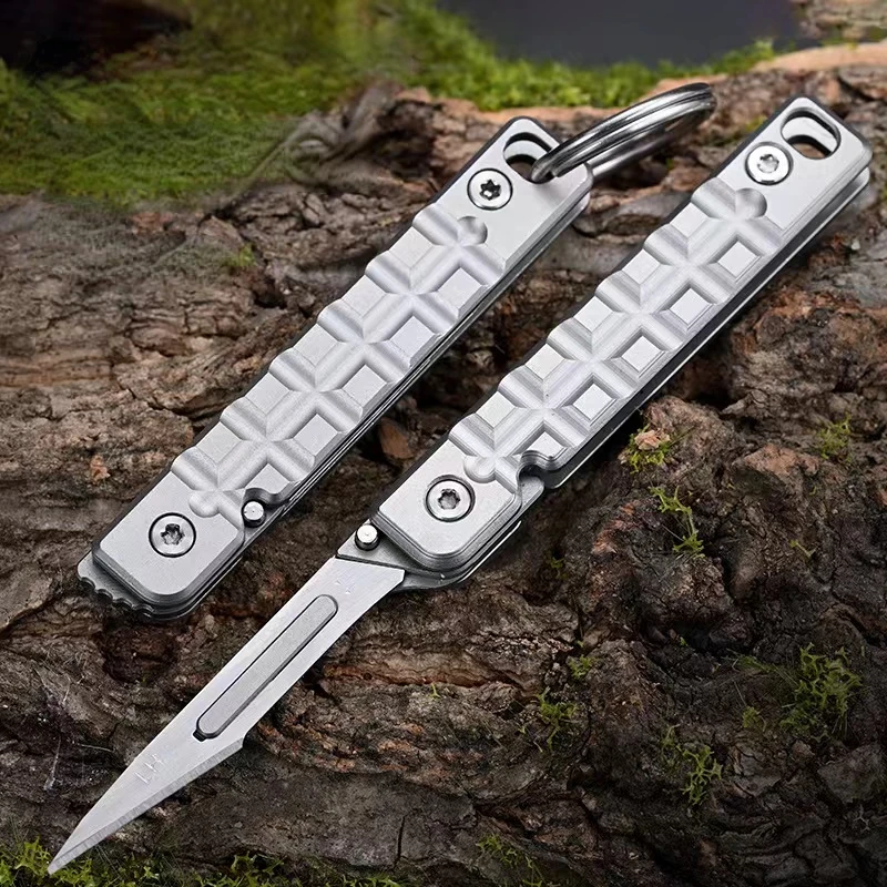 Cuchillo plegable táctico de acero inoxidable con hoja intercambiable - imagen 5
