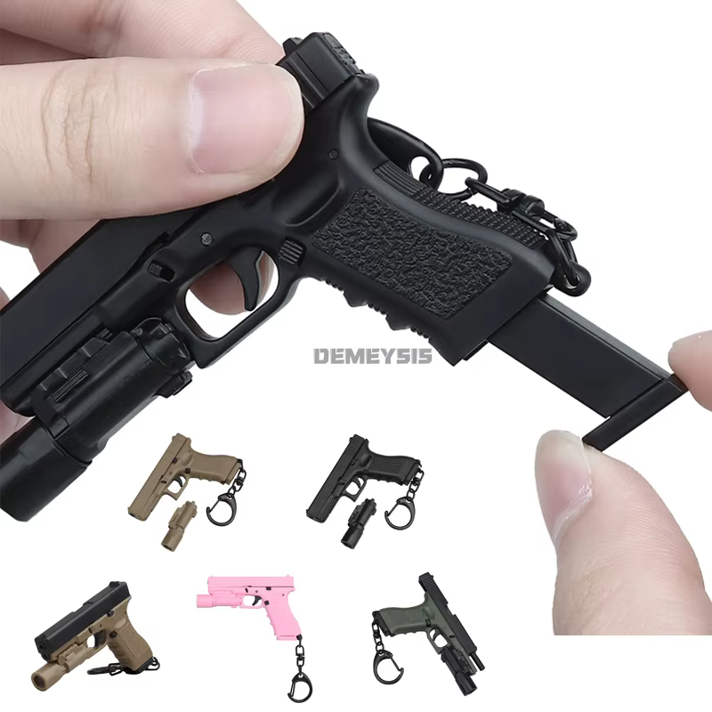 Llavero pistola miniatura realista de plástico con cargador extraíble - imagen 3