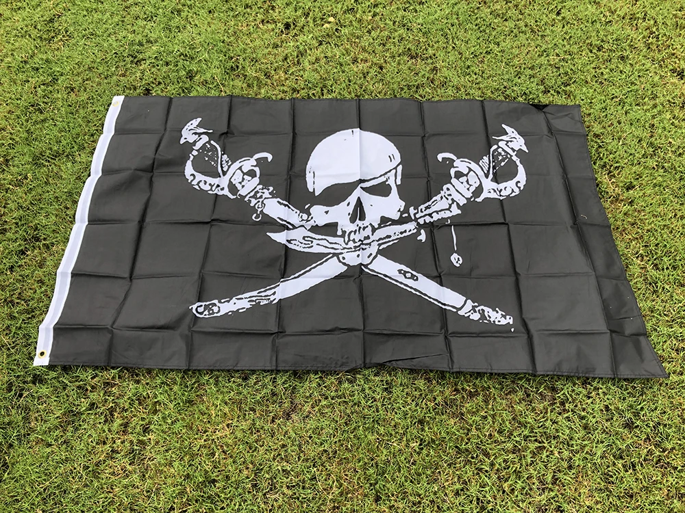 Detalle del cráneo y huesos cruzados en la bandera