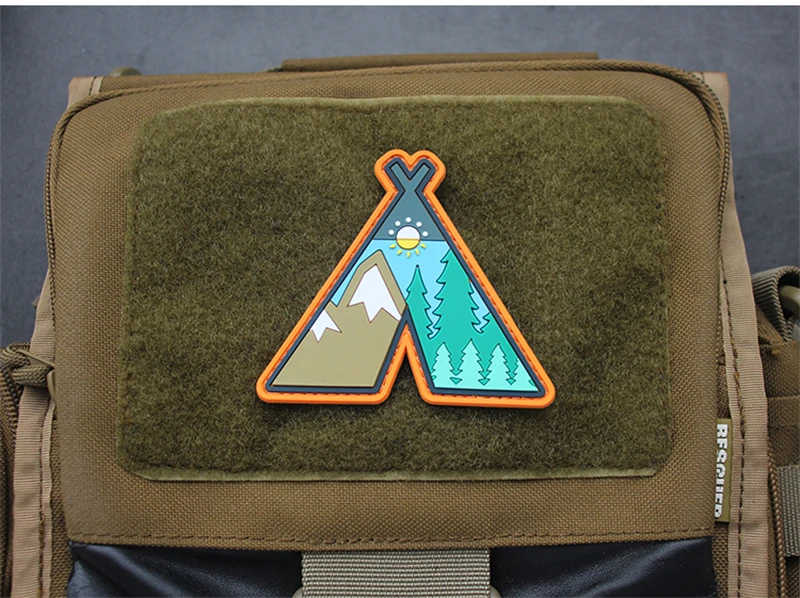 Parche de PVC con diseño de sol y montaña