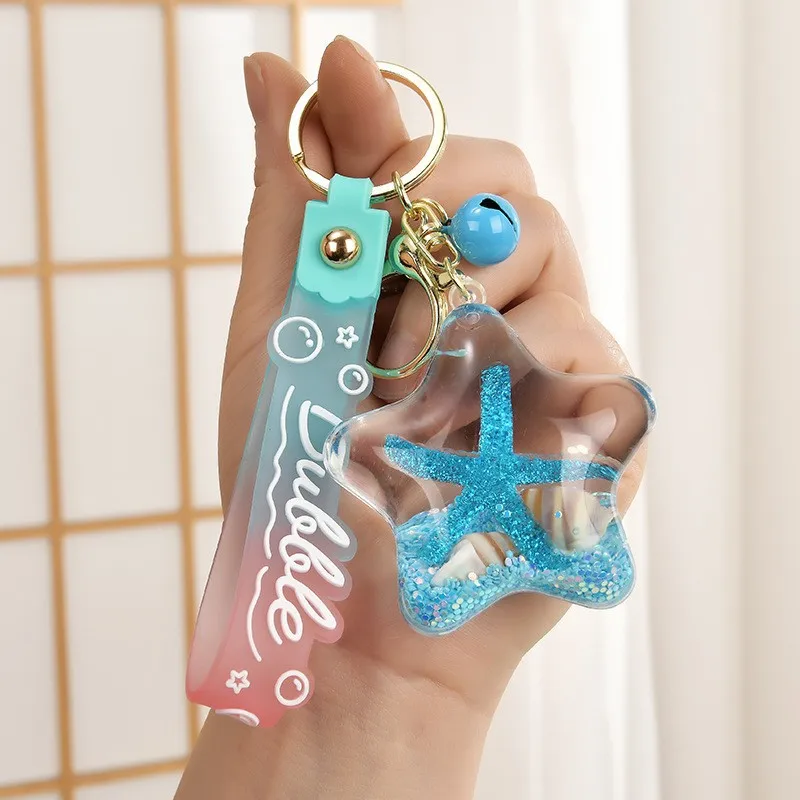 Llavero criaturas marinas: pez de cristal y delfín para bolso - imagen 5