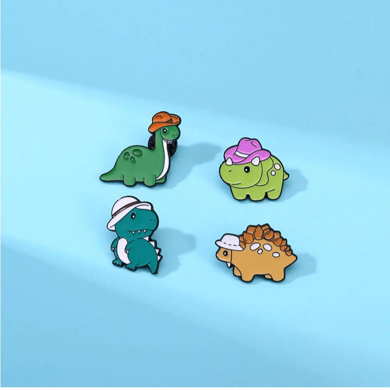 Broche con diseño de dinosaurio