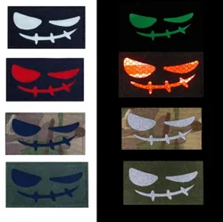 Parche táctico Velcro cara sonriente malvada luminosa para pecho