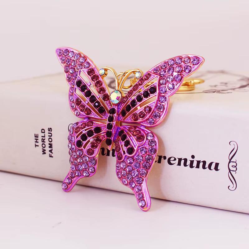 Llavero mariposa con pedrería multicolor para bolso - imagen 3