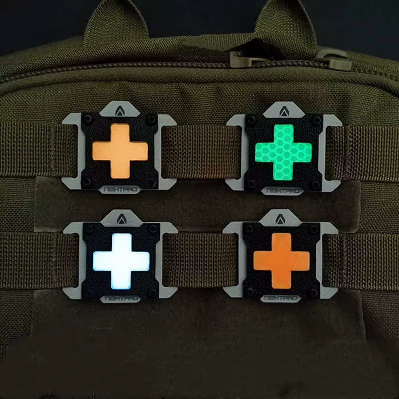 Clip MOLLE cruz reflectante – hebilla táctica ABS para mochila