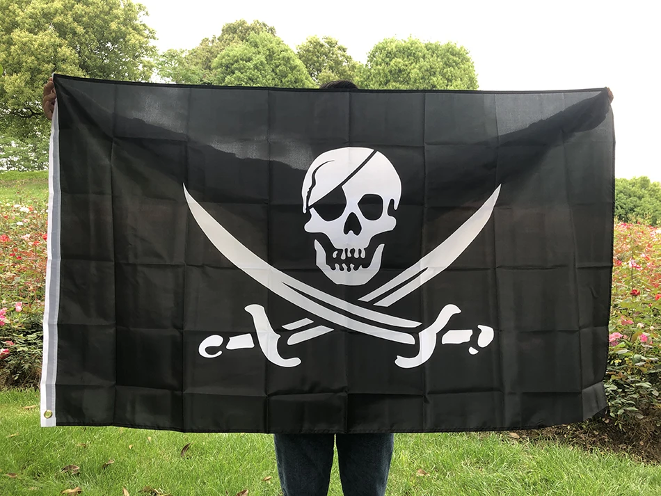 Bandera pirata con calavera y cuchillo
