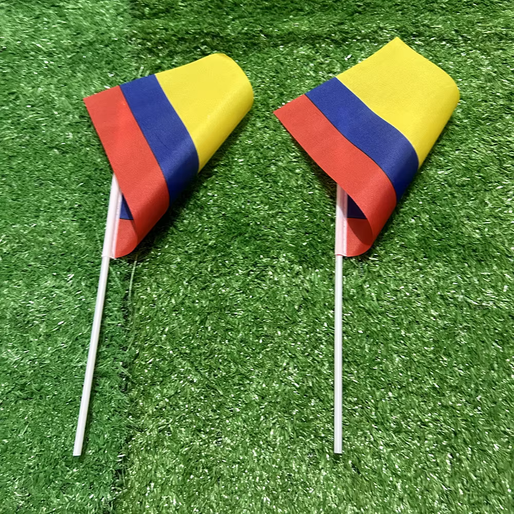 Banderas manuales Colombia 21x14cm con mástil plástico – Deportivo - imagen 4