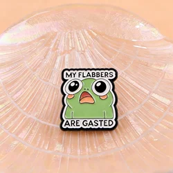 Pin esmaltado de rana con frases – Broche para solapa o mochila