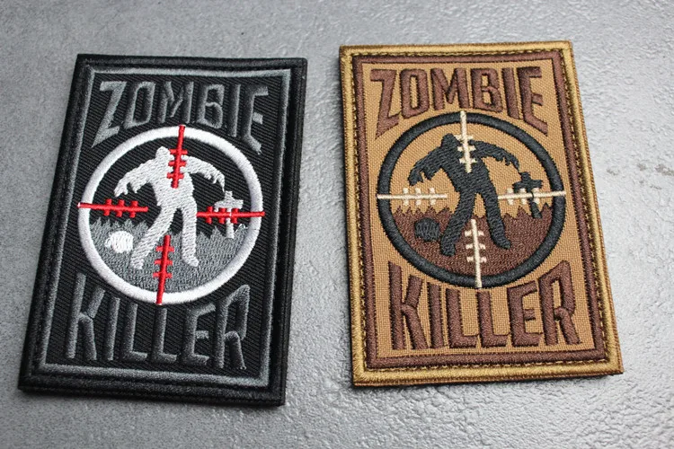 Parche bordado con diseño de zombi asesino sobre fondo oscuro