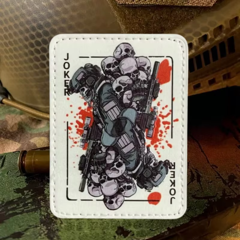 Parche con estampado Joker y sistema gancho y bucle