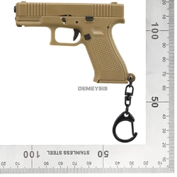 Llavero pistola miniatura realista de plástico con cargador extraíble