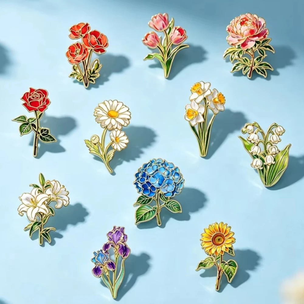 Broches botánicos esmaltados con motivos florales
