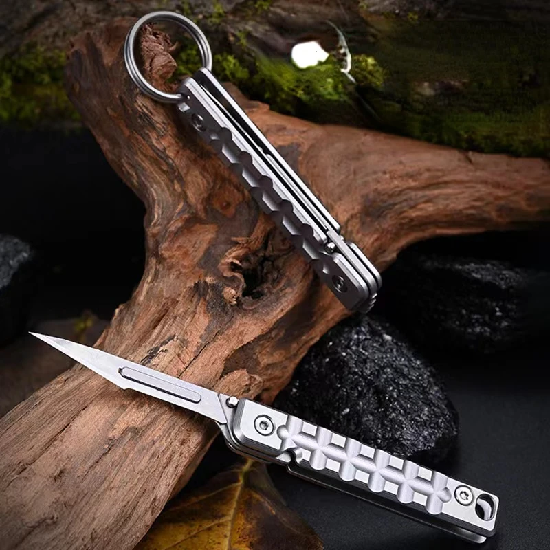 Cuchillo plegable táctico de acero inoxidable con hoja intercambiable - imagen 2
