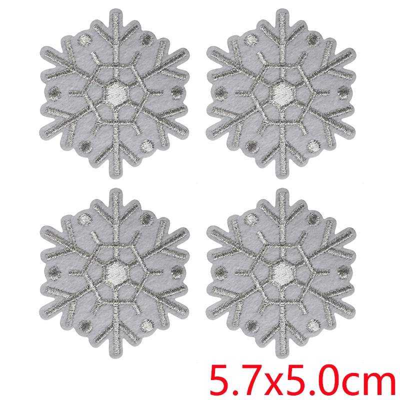 Detalle de los apliques brillantes de copos de nieve