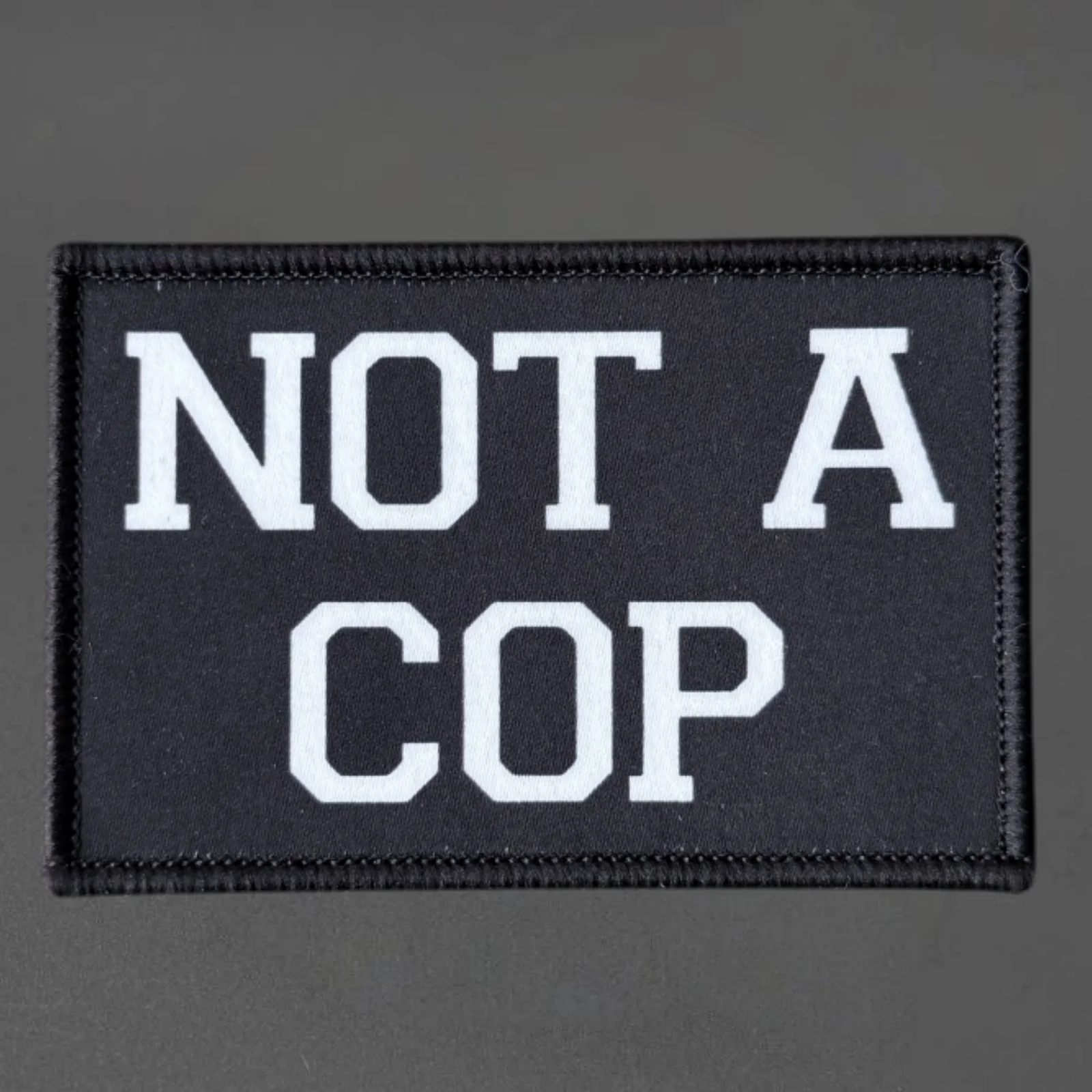 Parche moral táctico No soy policía con gancho y bucle - imagen 2