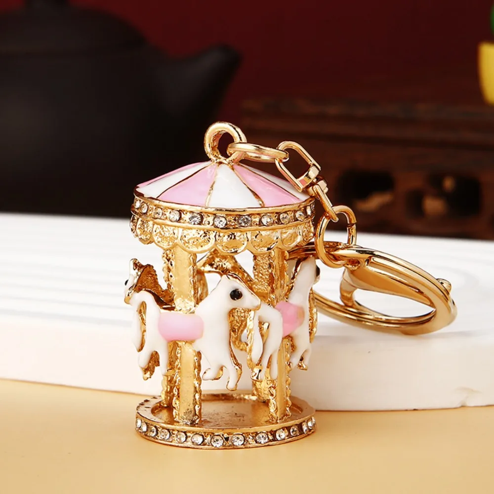 Llavero metálico carrusel con diamantes para llaves y bolso