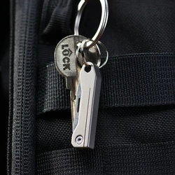 Navaja plegable táctica para bolsillo en titanio, llavero uso diario