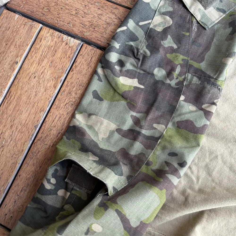 Detalle textil y costuras reforzadas en primera plana