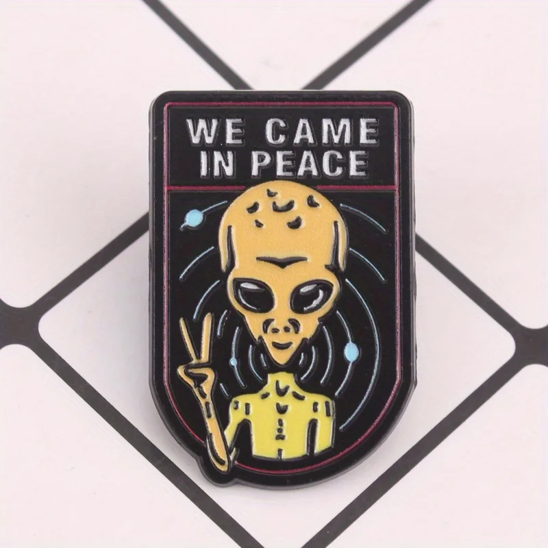Pin de solapa alienígena paz amarillo brillante escudo cósmico