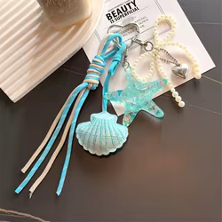 Llavero criaturas marinas: pez de cristal y delfín para bolso