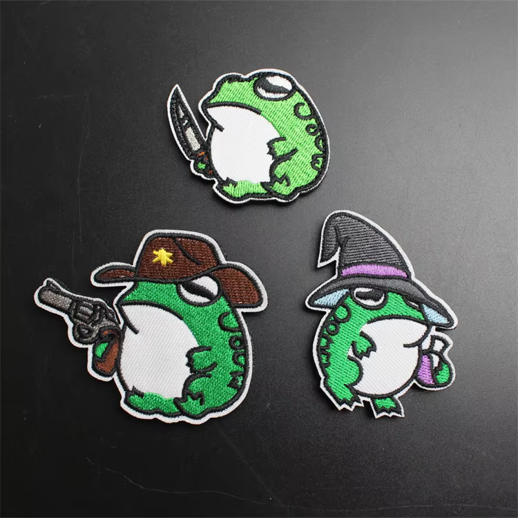 Parche bordado con diseño de rana y cuchillo