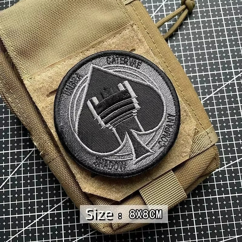 Emblema bordado COD sombra con diseño de serpiente
