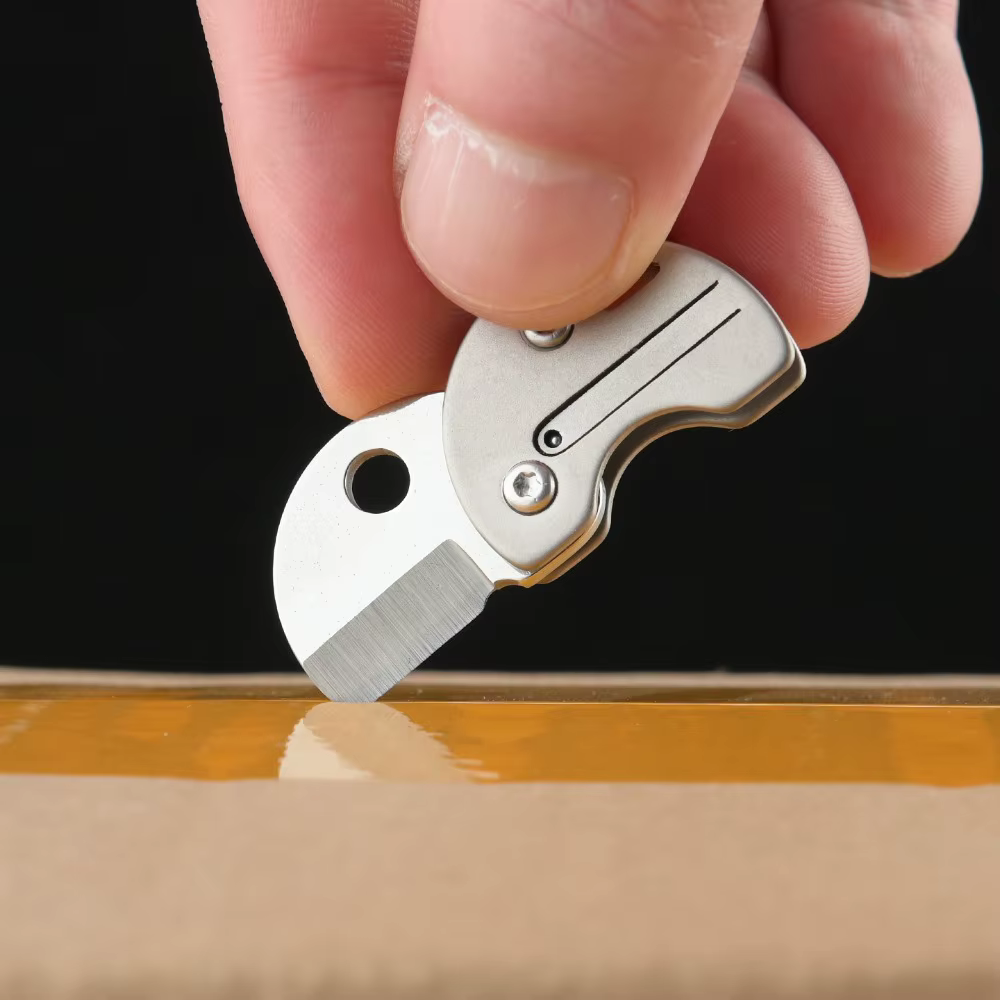 Navaja plegable táctica multiusos de titanio compacta para exteriores - imagen 2