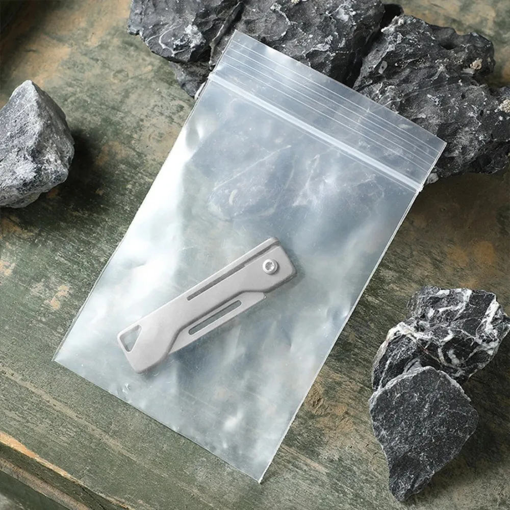 Cuchillo plegable de titanio para outdoor compacto, de bolsillo - imagen 2