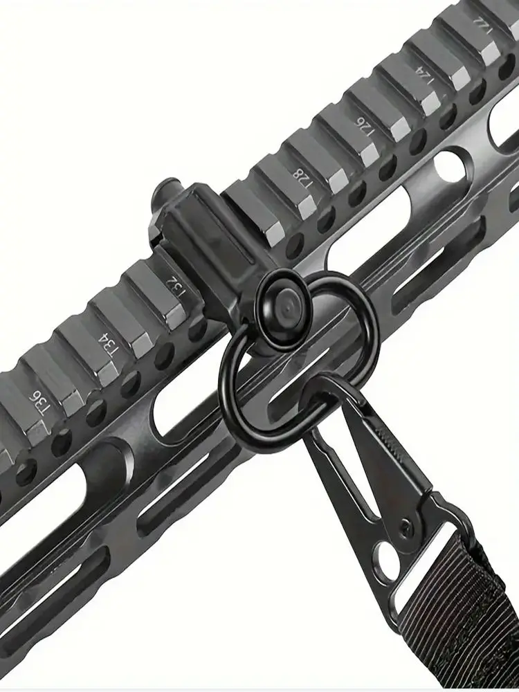 Detalle del botón QD y mecanismo de liberación rápida