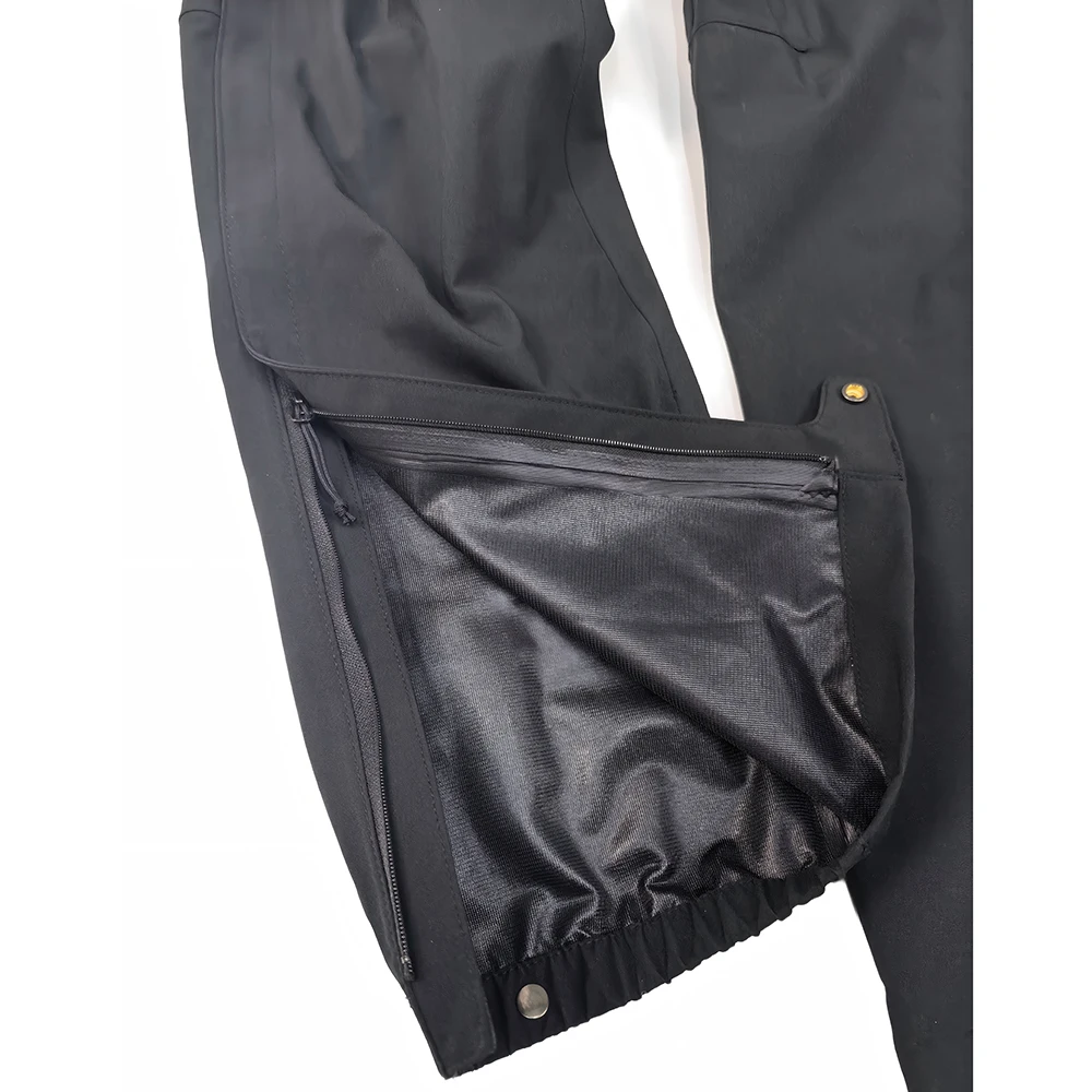 Pantalones impermeables sellado a presión con cremallera lateral - imagen 2