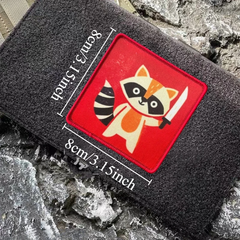 Parche táctico de mapache con diseño impreso y sistema de gancho y bucle