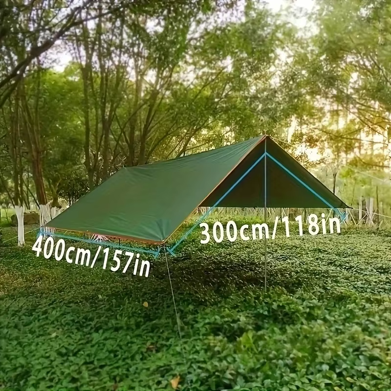 Toldo impermeable extendido en jardín