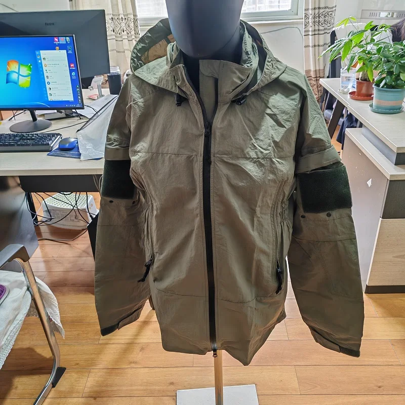 Chaqueta Softshell PCU L5 Gris con Capucha Cortavientos 160D