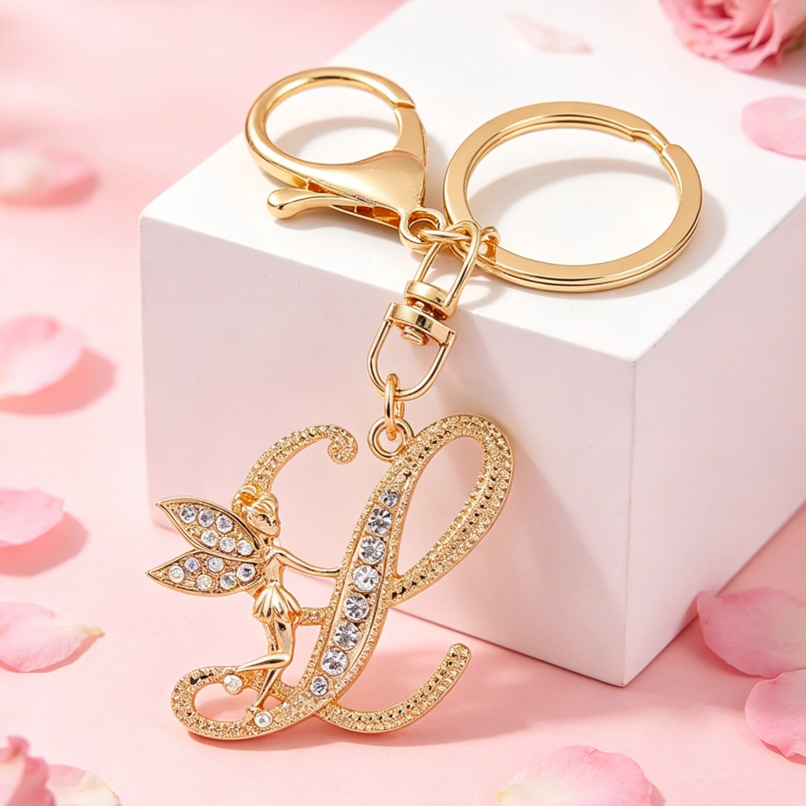 Llavero metálico con cristal dorado y letras para bolso - imagen 2