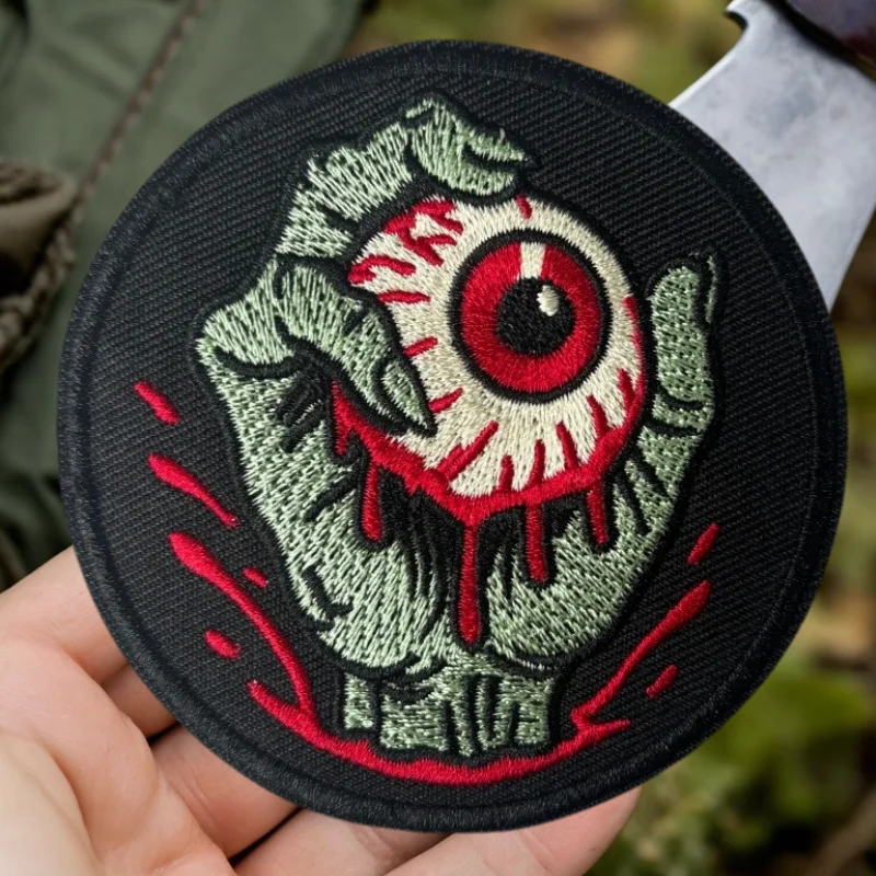 Insignia con gancho y bucle para fijación rápida